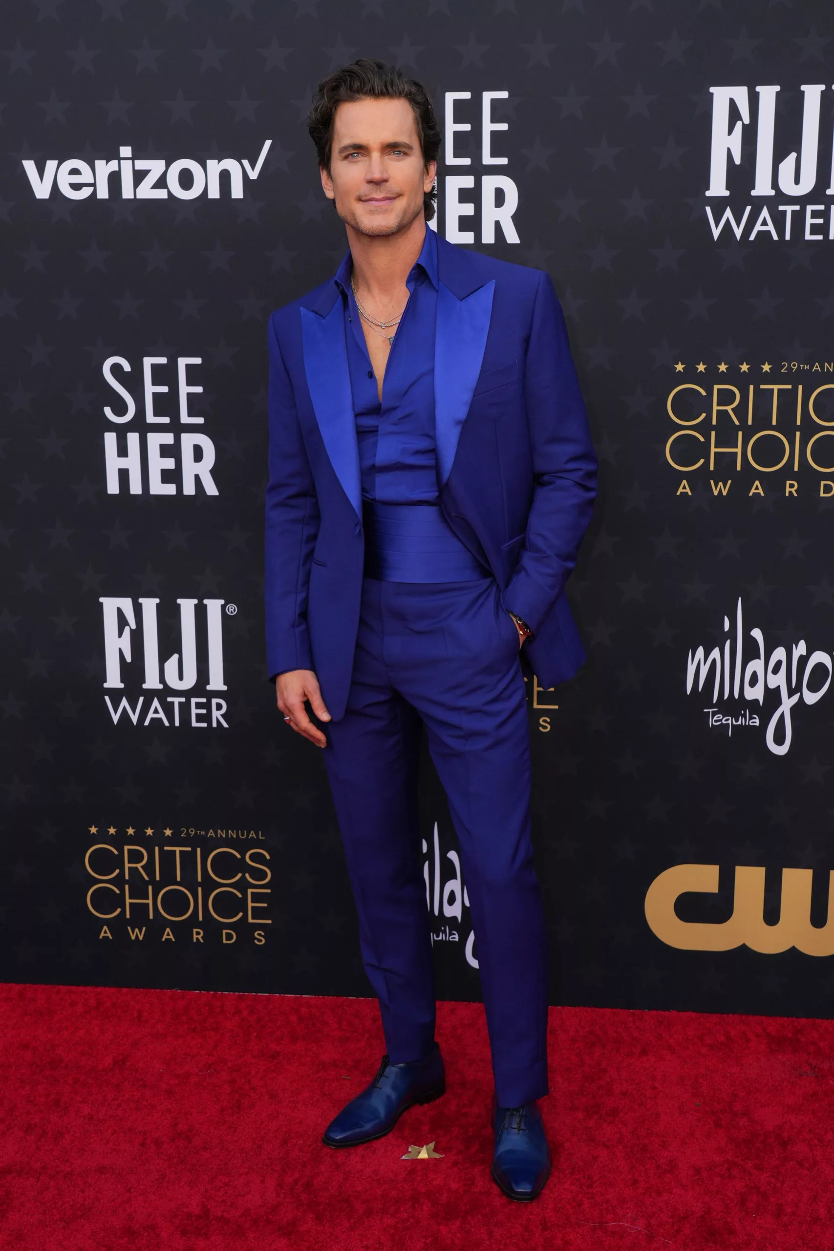 Matt Bomer, nominated in the best actor category for “Fellow Travelers,” brought contrast to the red carpet with a sleek bright blue Berluti suit and matching Oxford shoes.